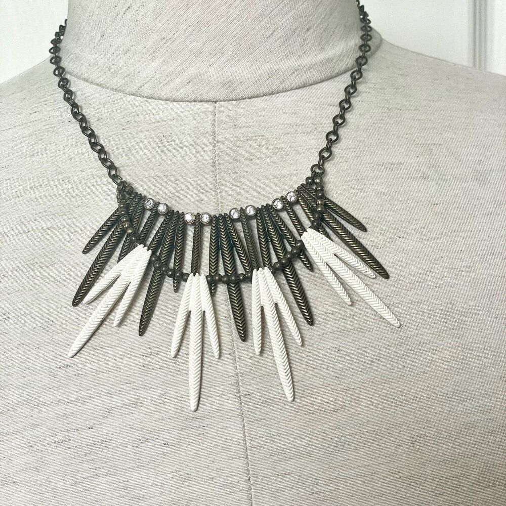 Brass tone and cream double strand statement necklace